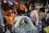 Indonesia Commuter Train Crash Toll Rises to 14 as Rescuers Complete Evacuation