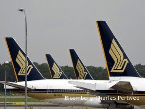 Singapore Airlines Masih Mengejar Laba
