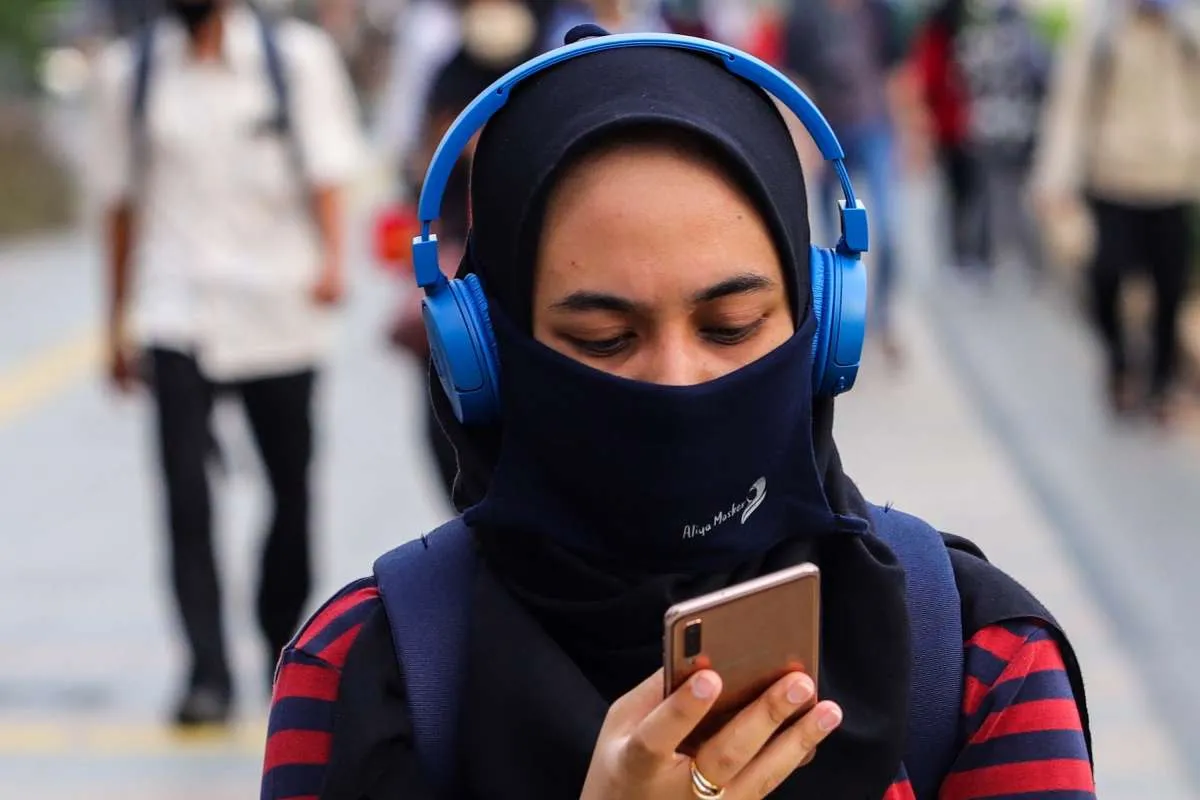 Jangan keliru, ini cara memakai masker kain yang benar