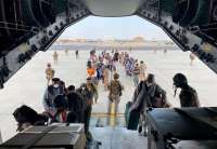 Kabul airport reopens to receive aid, domestic flights restart