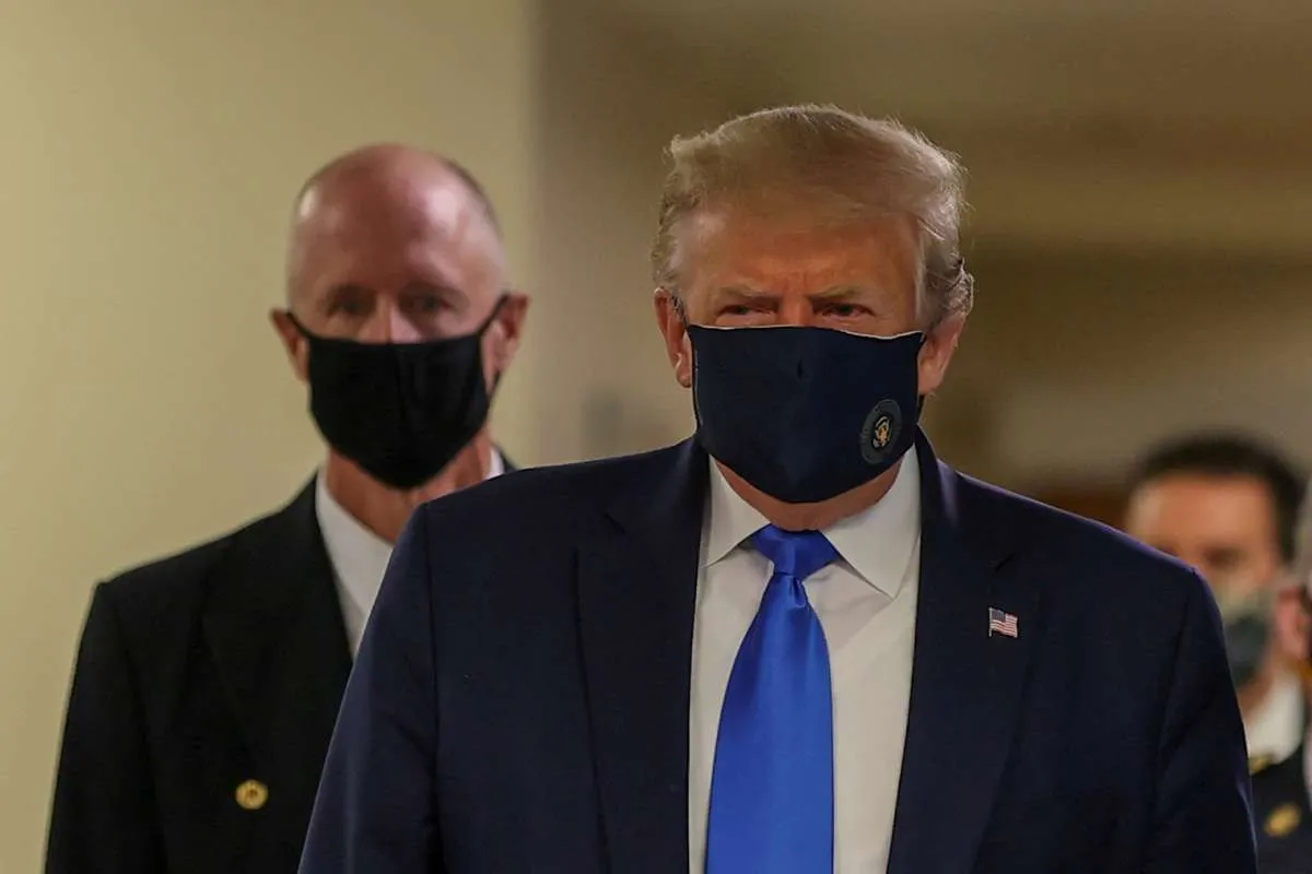 Trump menyerah: Suka tidak suka, semua warga AS harus pakai masker!