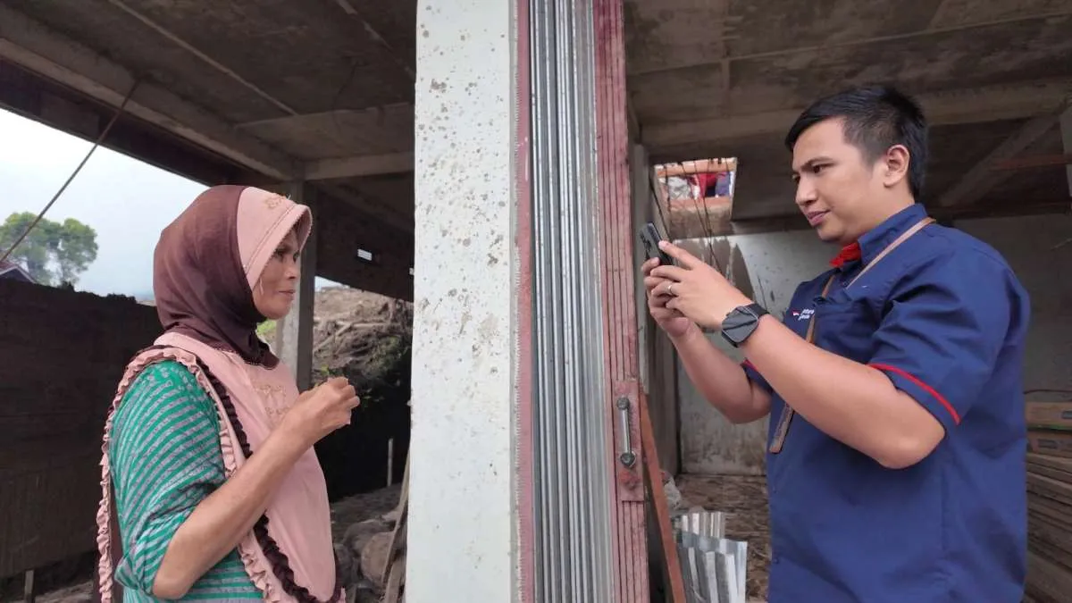 Akses Terputus, Pos Indonesia Tetap Salurkan BLTS Kesra di Daerah Bencana Agam