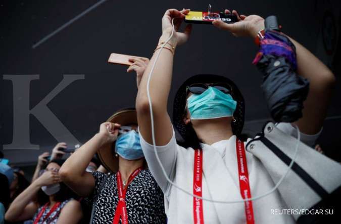 Expert sees coronavirus over by April in China, WHO still alarmed