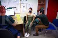 Britain starts planning for vaccine booster shots from September