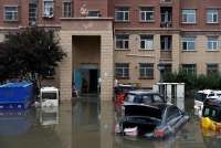 Flooding Hits China's South, Temperatures Sizzle Elsewhere