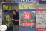 Penguatan dollar AS tak pengaruhi transaksi money changer