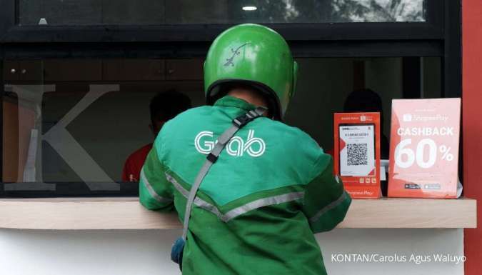 Indonesia's anti-trust watchdog levies $3 mln in fines on Grab and partner