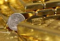 Harga Emas Anjlok Lebih 1%, Tertekan Penguatan Dolar Jelang Data Ketenagakerjaan AS