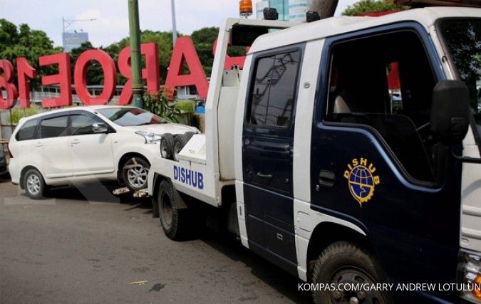 Berbeda dengan Depok, berikut sanksi bagi pemilik mobil di DKI yang tak punya garasi