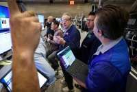 Wall Street Ditutup Bervariasi Kamis (15/5), Saham Cisco Naik dan UnitedHealth Anjlok