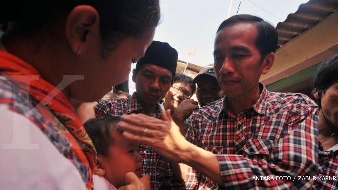 Jelang pemungutan suara, Jokowi boyong keluarga