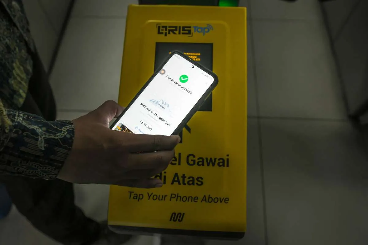 QRIS Tap Belum Bisa Digunakan di iPhone, Mengapa? Simak Penjelasan BI