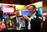 Wall Street Ditutup Naik Tipis Jumat (5/12), Ekspektasi Suku Bunga The Fed