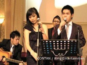 Laba bernyanyi usai main musik untuk pengantin