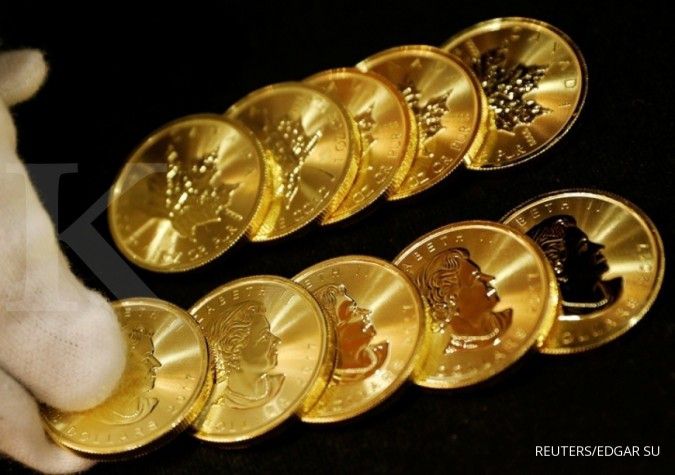 Harga emas naik tipis setelah The Fed menahan suku bunga