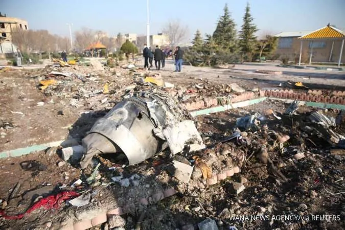 Iran probe says Ukrainian jet was on fire before crash