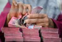 Rupiah Diproyeksi Kembali Melemah Hari Ini (28/7), Simak Sentimen yang Menyeretnya