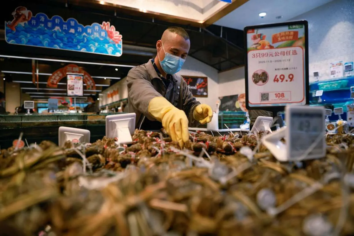 Tertekan Gelombang Panas dan Pembatasan Covid, Indeks Harga Konsumen China Melambat