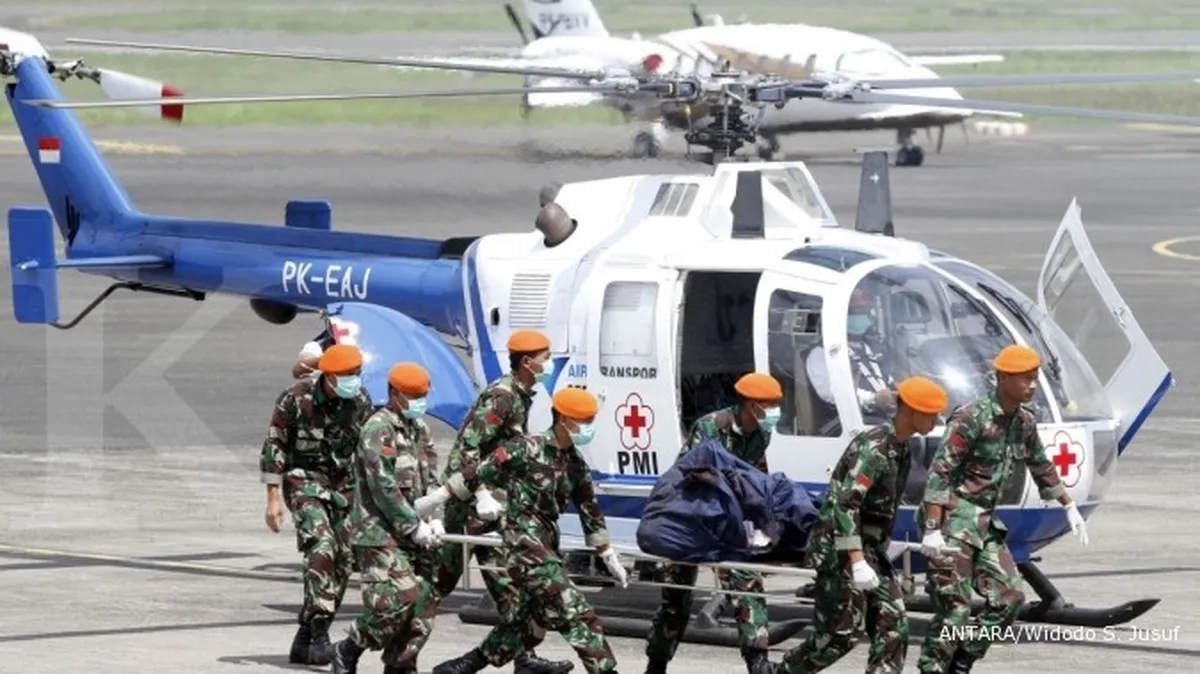 Pintu Helikopter TNI jatuh menimpa rumah warga