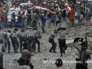 Papua violence worries business