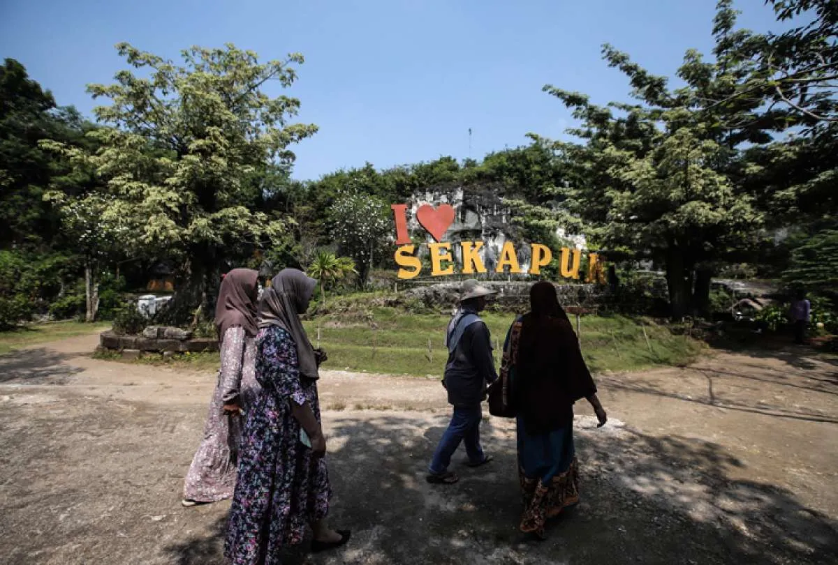 Prakiraan Cuaca Jawa Timur (21/5) Sumenep Hujan Ringan, Suhu Bangkalan & Tuban 33°C