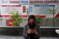 OJK Resmikan Chatbot Cegah Penipuan Uang, Cek Daftar Pinjol & Investasi Ilegal 2022