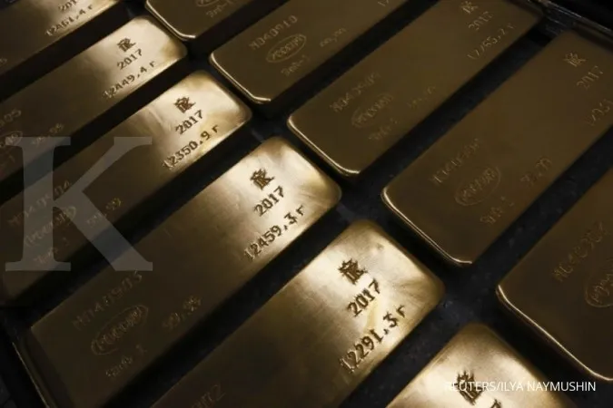 Gold flat ahead of Fed outcome, lower oil prices lift risky bets