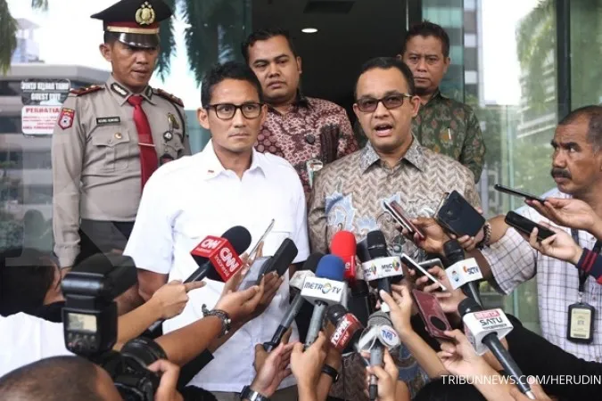 Anies-Sandiaga team happy with polls 