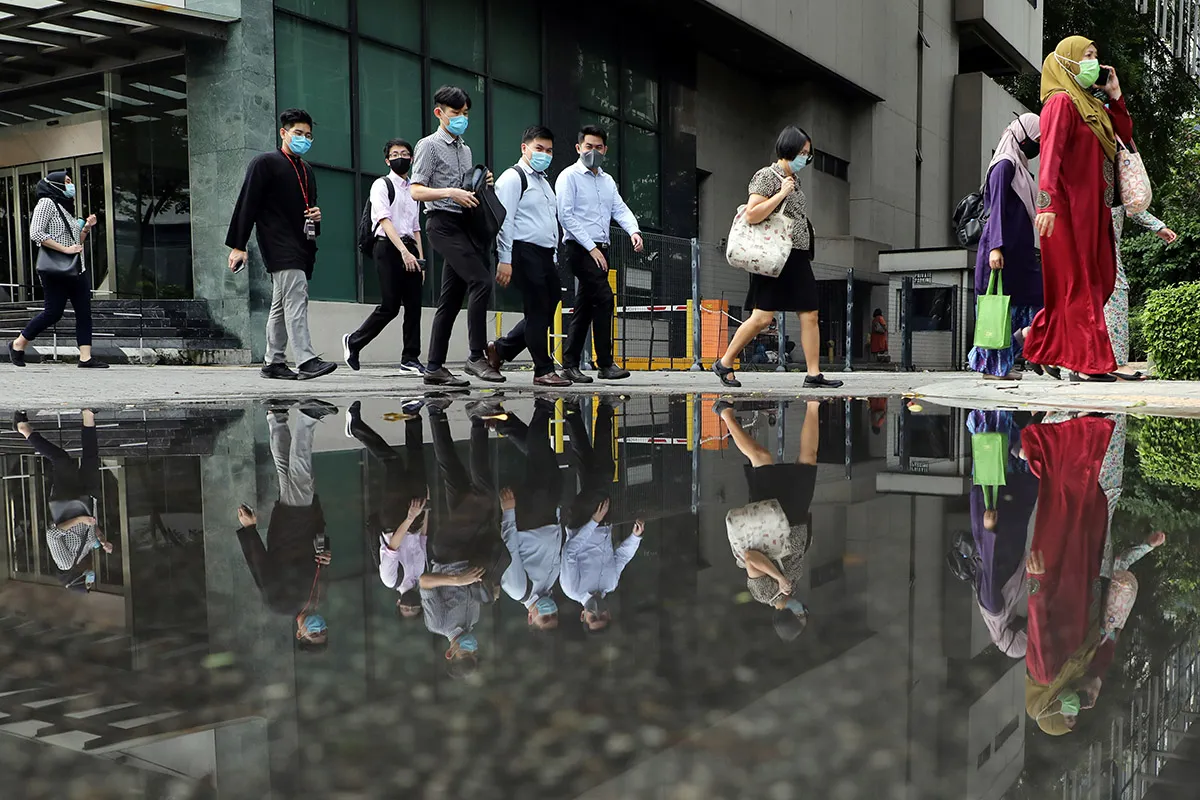 Virus corona makin menggila di Malaysia, kasus baru hampir 700