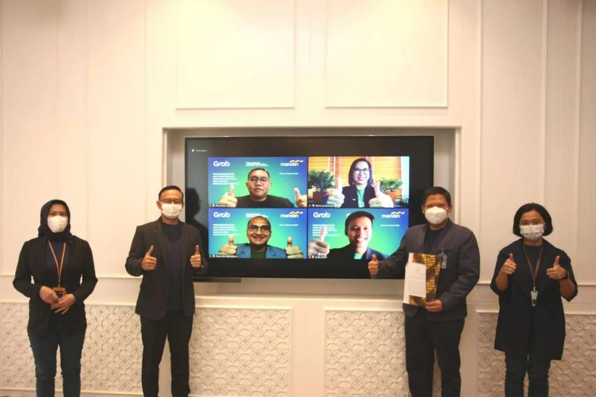 Sepakat! Bank Mandiri Teken Kerjasama Strategis dengan Grab 