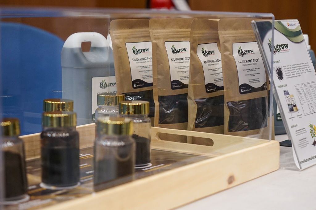 Kontan - Bukit Asam Kilas Online.