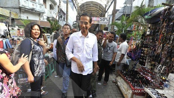 Jokowi: Banjir di mana, yang dimaki ya saya