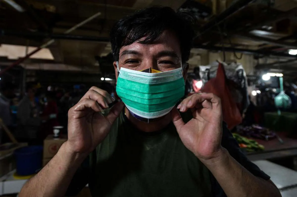 Inilah rekomendasi WHO tentang cara penggunaan masker yang benar 