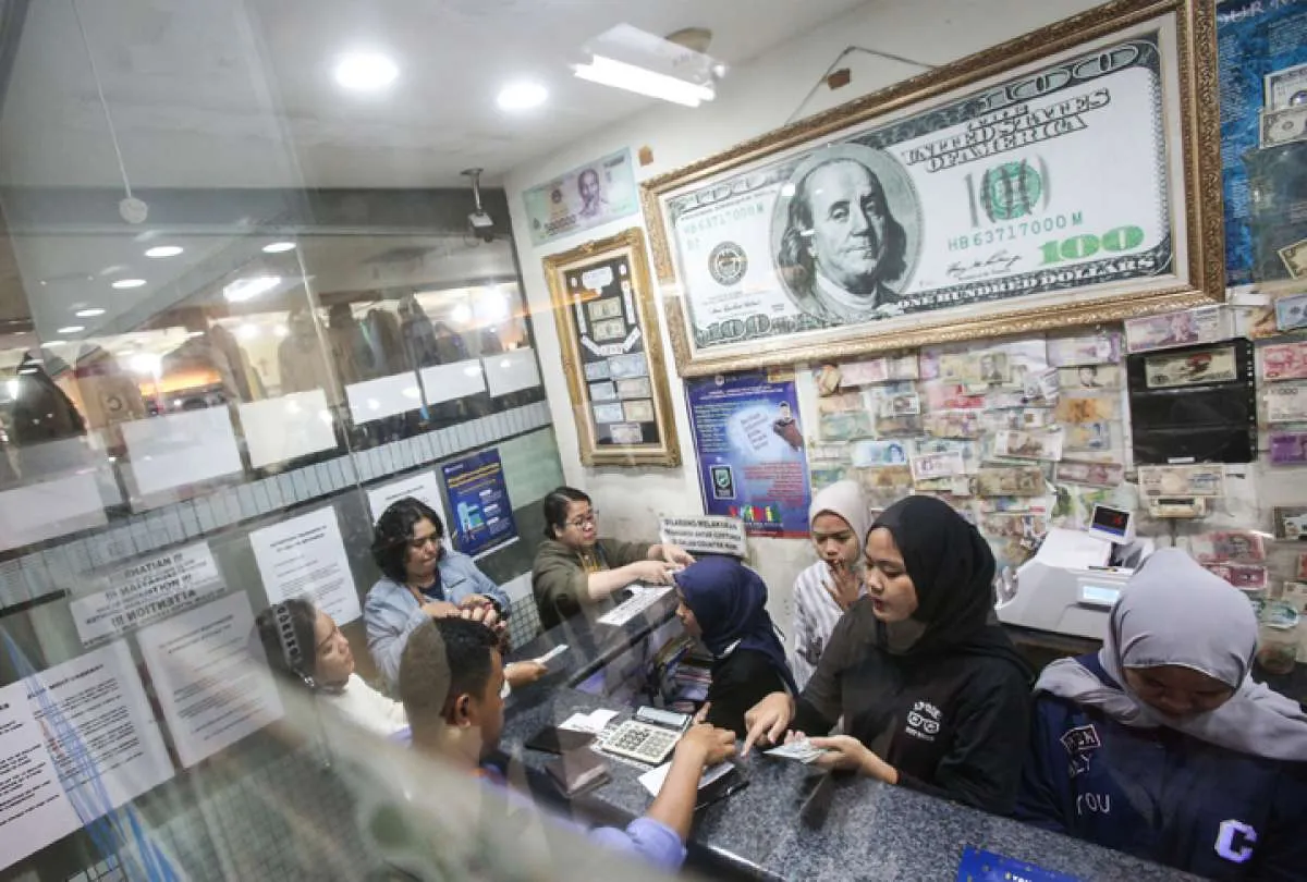 Rupiah melanjutkan pelemahan ke Rp 14.291 per dolar AS siang ini