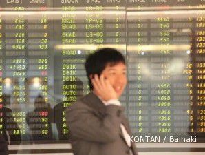 Setelah bergerak liar, indeks sesi I berakhir di zona positif