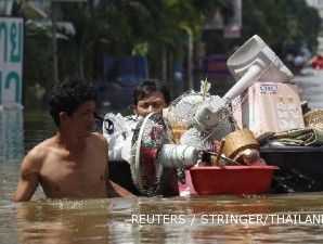 Banjir Thailand merendam laju kinerja perusahaan global
