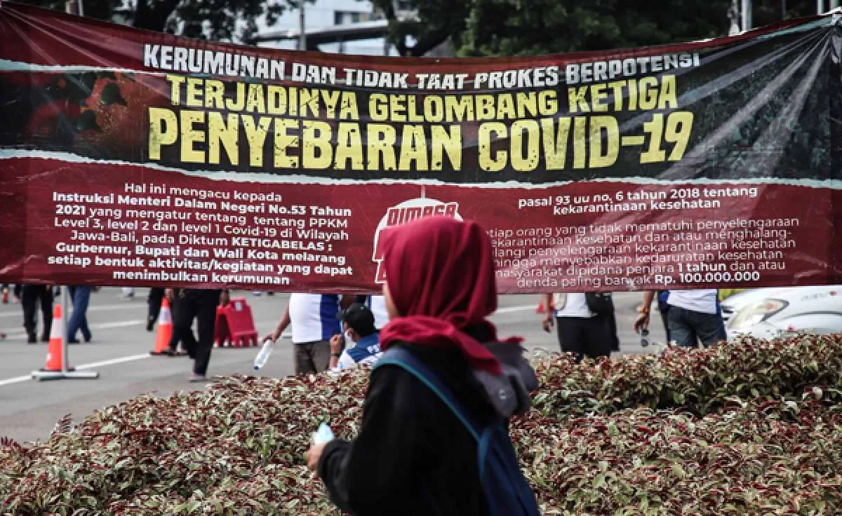 Pengendalian berlapis saat Nataru, ini strategi pemerintah antisipasi kasus Covid-19