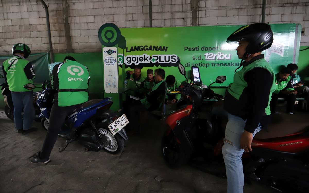 Perpres Transportasi Online Menunggu Aksi Merger GOTO dan Grab