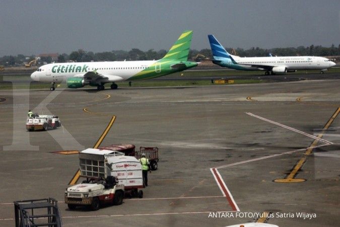 Menakar efek beleid baru tarif pesawat terbang ke emiten penerbangan