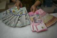 Kompak, Rupiah Jisdor Melemah 0,25% ke Rp 16.329 per Dolar AS pada Kamis (17/7)