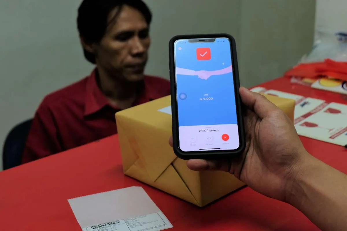 Perkuat pasar bisnis uang elektronik, LinkAja gandeng JNE