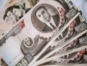 Dollar Taiwan dan Won Korsel Menggencet Dolar AS