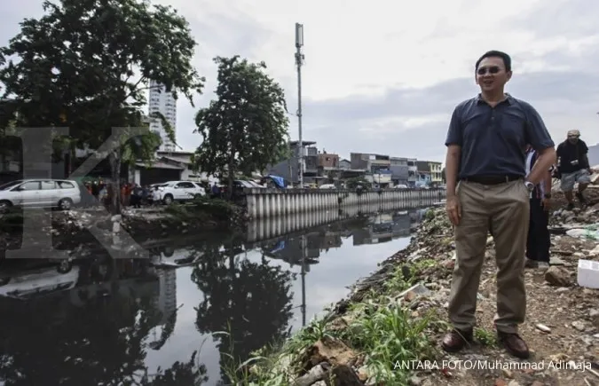 Flooding troubles Ahok on first day at City Hall