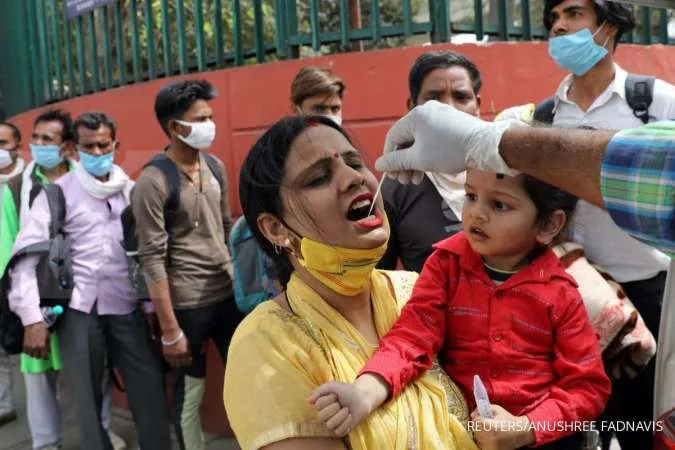 India's Covid-19 infections hit another record, weekend lockdown in Maharashtra