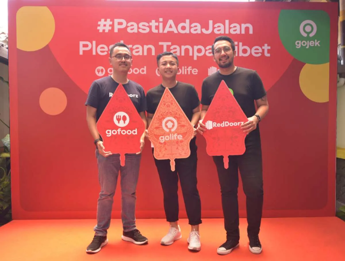 GoJek gandeng RedDoorz hadirkan potongan order GoFood dan GoMassage