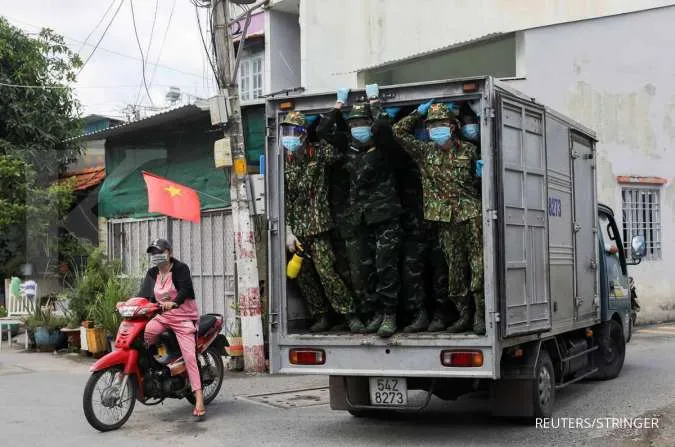 Vietnam PM warns of long coronavirus fight as crisis deepens