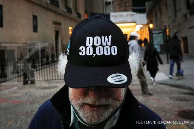 Wall Street rises, Nasdaq hits record high on recovery hopes