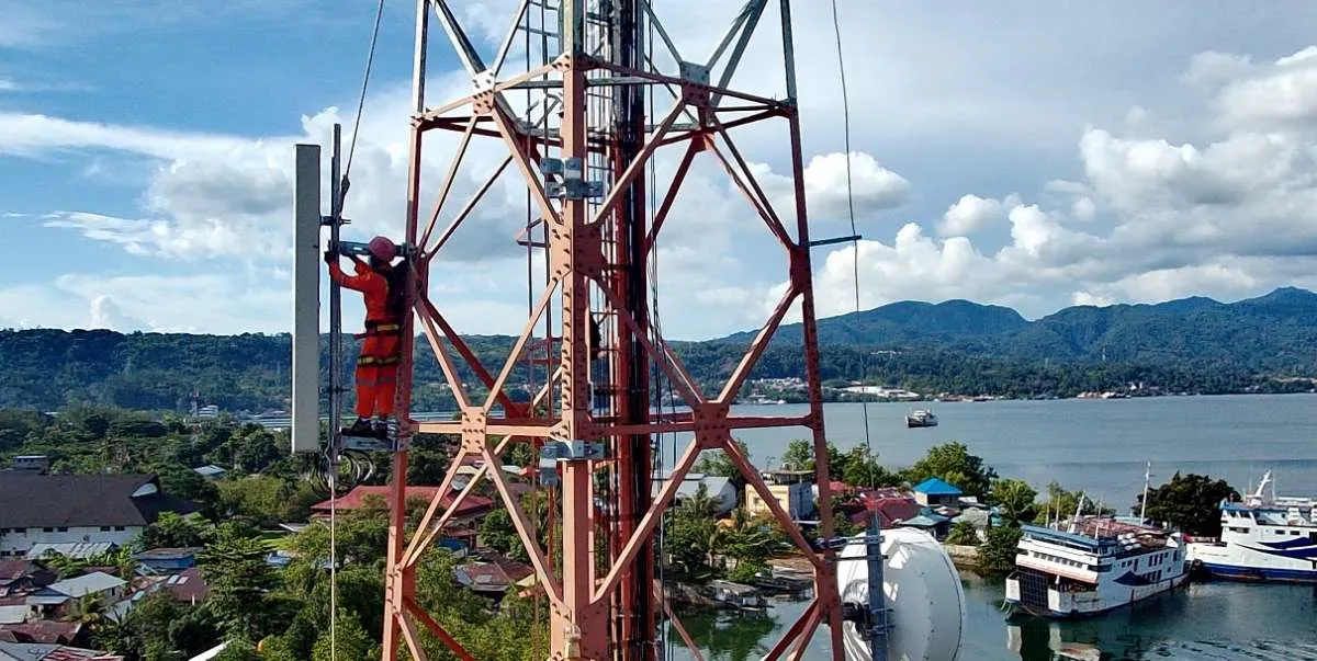 Merger direstui Kominfo, Indosat (ISAT)-Tri harus kembalikan pita frekuensi 5Mhz