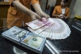 Besaran biaya bunga yang dihemat atas konversi pinjaman ke mata uang EUR dan JPY