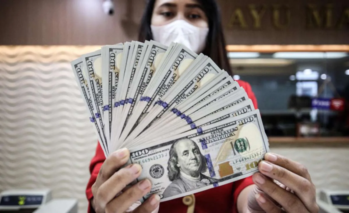 Kompak, Rupiah Jisdor Menguat 0,03% ke Rp 14.359 Per Dolar AS Pada Rabu (13/4)